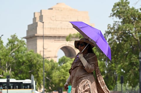 People seen out on a Hot Day at Kartavya Path on April 22, 2025 in New Delhi.
