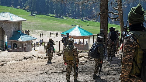 In this photo from April 23, 2025, security personnel carry out a search operation at the Baisaran area in Pahalgam following a terrorist attack the previous day.