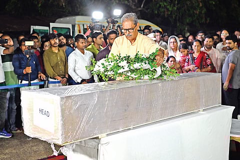Deputy CM KV Singh Deo pays floral tributes to the mortal remains of Prasant Satpathy, who died in the terrorist attack in Pahalgam, at Bhubaneswar airport on Wednesday night.