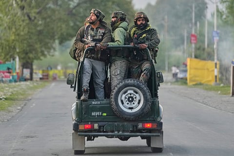 Indian Army soldiers patrol in armored vehicle near Pahalgam in south Kashmir after assailants indiscriminately opened fire on tourists 