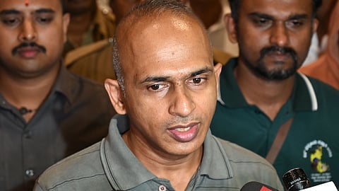 Pradeep, brother-in-law of Shivamogga realtor Manjunath Rao,  as he waited to receive the mortal remains of Rao.