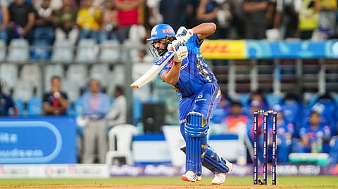Mumbai Indians' Rohit Sharma plays a shot during an IPL 2025 T20 cricket match between Mumbai Indians and Chennai Super Kings, at the Wankhede Stadium, in Mumbai, Sunday, April 20, 2025.