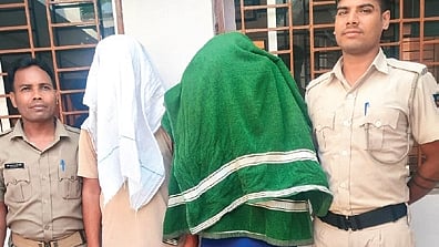 Two of the accused along with police.