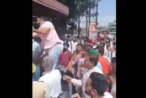 The BJP leaders assaulted the journalist covering their protest in full public view. 