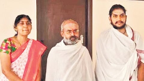 Ganesha Sharma Dravid (R) with his parents.