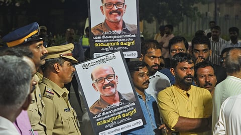 Citizens wait near the airport to receive the mortal remains of N Ramachandran, who was slain in a terrorist attack at Pahalgam in South Kashmir