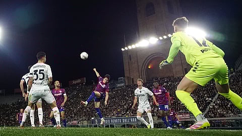 Bologna's Giovanni Fabbian, centre left, scores their side's first goal of the game during the semi-final second leg Frecciarossa Italian Cup soccer match between Bologna and Empoli on Thursday April 24, 2025 
