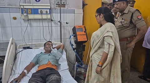 The District Magistrate of Bahraich, Monica Rani meeting the injured at the district hospital.