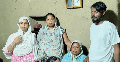 Razia Sultana and her family members at their home in Balasore district.