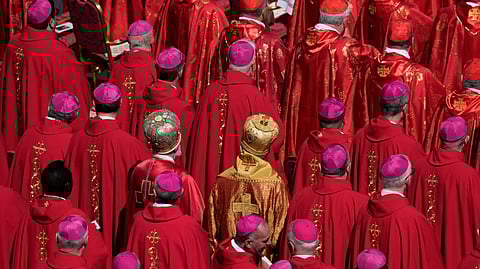 Cardinals stand during the funeral of Pope Francis in St. Peter's Square at the Vatican, Saturday, April 26, 2025. 