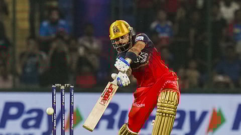 Royal Challengers Bengaluru's Virat Kohli plays a shot during an Indian Premier League  2025 T20 cricket match between Delhi Capitals.