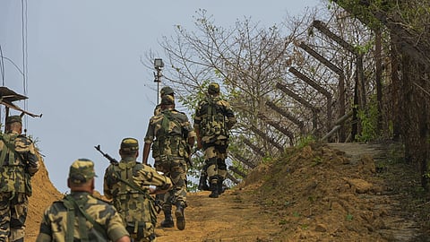 Security personnel stand guard, in Srinagar.