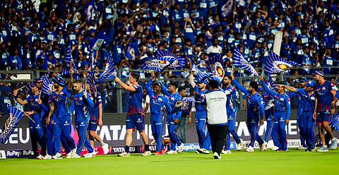 Mumbai Indians' players acknowledge fans as they celebrate after winning the Indian Premier League (IPL) 2025 cricket match against Lucknow Super Giants, in Mumbai, Sunday, April 27, 2025