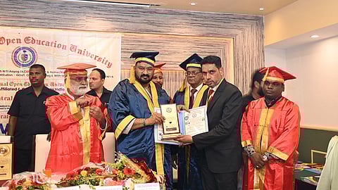 Minority Affairs Minister Hafizul Hasan recieving his PhD degree from Bharat Virtual Open Educational University. 