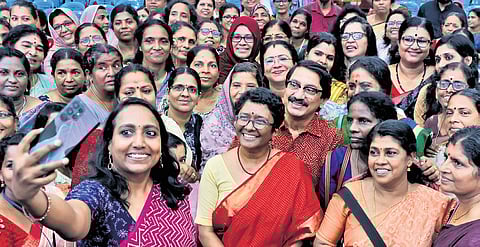 A friend takes a selfie with Chief Secretary Sarada Muraleedharan, who is retiring on Wednesday, her husband V Venu, and colleagues during a farewell gathering at Women’s College, Vazhuthacaud in Thiruvananthapuram on Monday.