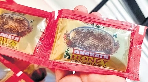25g honey packets ready for distribution.