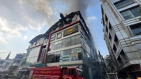 View of an electronics goods showroom building after a fire, that broke out early morning, was controlled, in the suburban Bandra area of Mumbai, Tuesday, April 29, 2025.