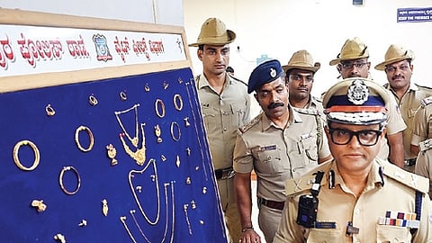 City Police Commissioner B Dayanada looks at seized goods