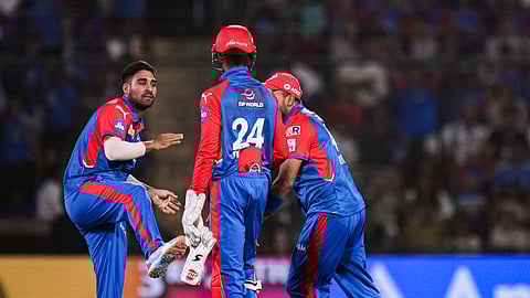 Delhi Capitals' bowler Vipraj Nigam (L) celebrates with teammates after the wicket of KKR's batter Sunil Narine during the IPL 2025 cricket match between Delhi Capitals and Kolkata Knight Riders on Tuesday, April 29, 2025.