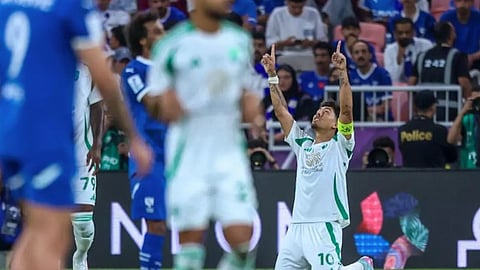 Ahli's Brazilian forward #10 Roberto Firmino celebrates afer scoring his team's first goal during the AFC Champions League semi-final match between Saudi's Al-Hilal and Saudi's Al-Ahli at King Abdullah Sports City in Jeddah on April 29, 2025.