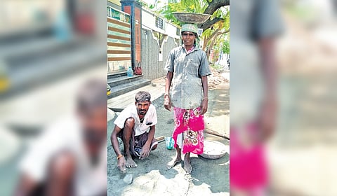 Bhaskaran and Sathiya who are construction workers