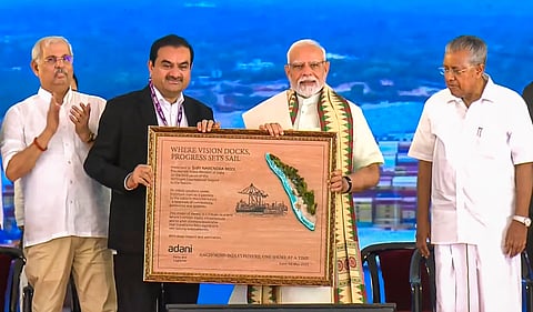 Prime Minister Narendra Modi, Kerala Governor Rajendra Arlekar, Chief Minister Pinarayi Vijayan, Adani Group Chairman Gautam Adani and others during the inauguration of the Vizhinjam International Seaport, in Thiruvananthapuram.