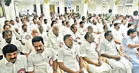 AIADMK executive committee members at the meeting held in Chennai on Friday. (inset) EPS and other leaders 