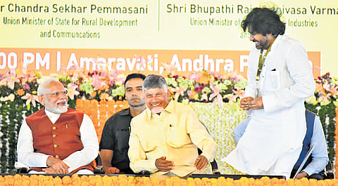 Prime Minister Narendra Modi, Chief Minister N Chandrababu Naidu and Deputy Chief Minister Pawan Kalyan at the relaunch of Amaravati works in Velagapudi on Friday.