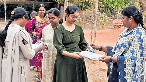 Image used for representational purposes only. Hall tickets of students being verified at an exam centre.