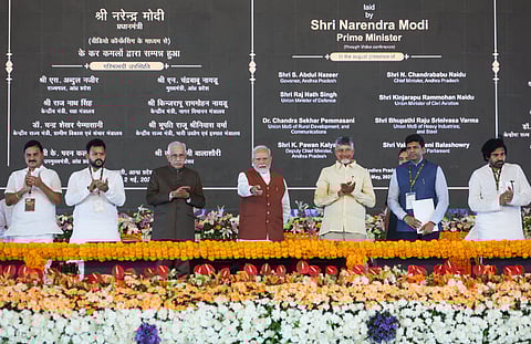 Prime Minister Narendra Modi with Andhra Pradesh Chief Minister Chandrababu Naidu during the inauguration and foundation stone laying ceremony of various development projects, in Amaravati, Andhra Pradesh. 