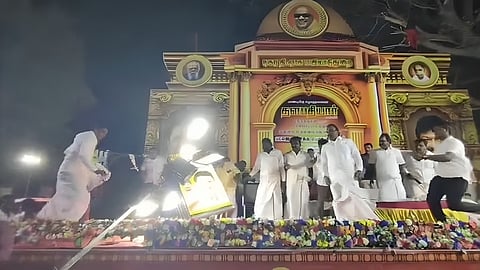 Heavy lights mounted on steel rod stands toppled over on the podium where DMK leader A Raja was delivering a speech.
