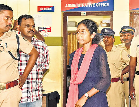 Greeshma, the Akshaya Centre staffer who allegedly forged a NEET hall ticket, at the Pathanamthitta police station on Monday