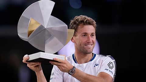 Norway's Casper Ruud holds the trophy after winning the Madrid Open tennis final in Madrid, Spain, Sunday, May 4, 2025.