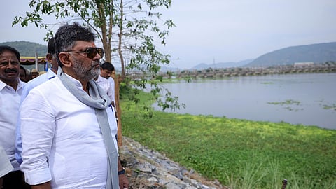 Deputy Chief Minister DK Shivakumar along with officials inspects the tunnel lining near Sattegala Bridge in Mandya on Monday.