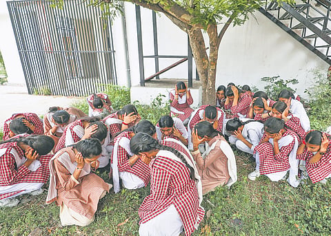Students take part in a drill as they prepare for the nationwide civil defence drill scheduled for May 7, in Jammu, on Tuesday | PTI