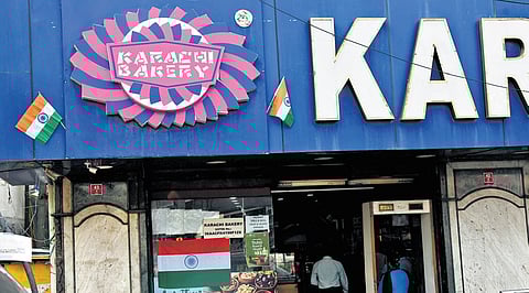 An outlet of Karachi Bakery displays the national flag on its signboard to assert its Indian origin in the backdrop of Operation Sindoor.
