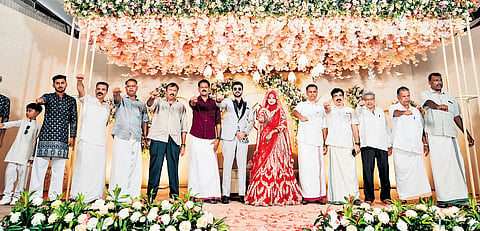 Muhammed Hisham and Nidha Sherin, along with their relatives, taking the ‘oath of love’ against the Pahalgam terror attack