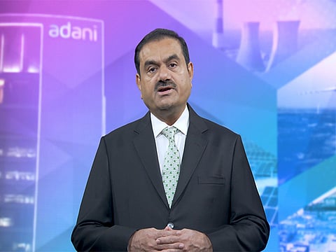 Adani shares slide sharply amid reports of US probe; group denies wrongdoing