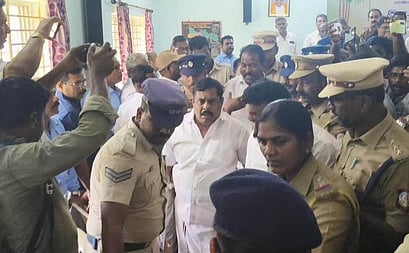 ADMK MLA's escorted out of the review meeting at the Subramaniya Siva Cooperative Sugarmill after tensions flared between ADMK