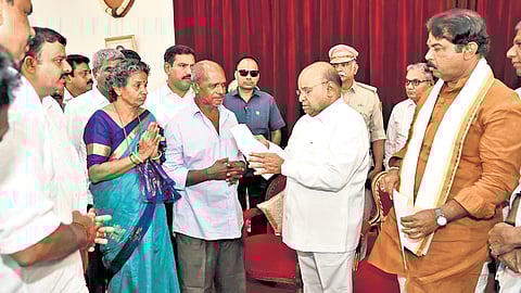 Parents of murdered VHP activist Suhas Shetty and BJP leaders led by state president BY Vijayendra and LoP R Ashoka meet Governor Thaawarchand Gehlot at Raj Bhavan in Bengaluru on Friday.