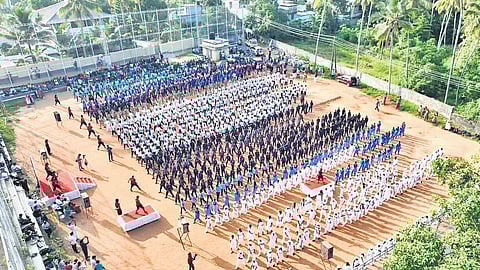 Students participate in a mass drill and assembly at Kandala Stadium as part of the lead-up to the 18-km human chain against drug abuse in Kattakada constituency.