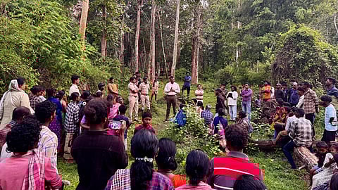 The tribals talking to forest officials in the Nagarahole Tiger Reserve
