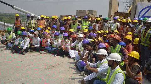 Delhi PWD Minister Parvesh Verma in a group photo with workers and engineers during an inspection of the Barapullah Phase 3. Image used for representation only.