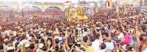 Lord Kallalagar is entering the Vaigai river as a part of the Chithirai festival in Madurai on Monday 