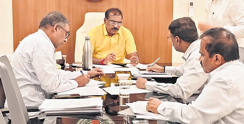 Water Resources Minister Nimmala Ramanaidu holds a review meeting on the canal maintenance works on Monday.