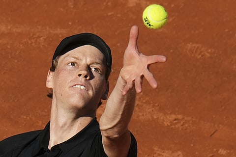 Italy's Jannik Sinner serves the ball to Netherlands' Jesper De Jong during their tennis match at the Italian Open at the Foro Italico, in Rome, Monday, May 12, 2025. 