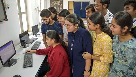 Students in Prayagraj check scores after CBSE declared board exam results on May 13, 2025. 