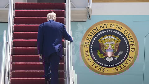 US President Donald Trump boards Air Force One at Joint Base Andrews, Md., on his way to Riyadh, Saudi Arabia, Monday, May 12, 2025.