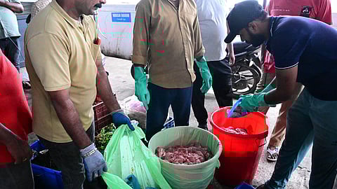 The health wing of the Kochi corporation sizing the stale ingredients from the catering unit. 