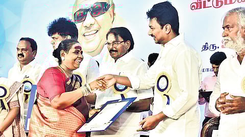 Deputy CM  Udayanidhi Stalin giving away the pattas at Tiruvottiyur. 
